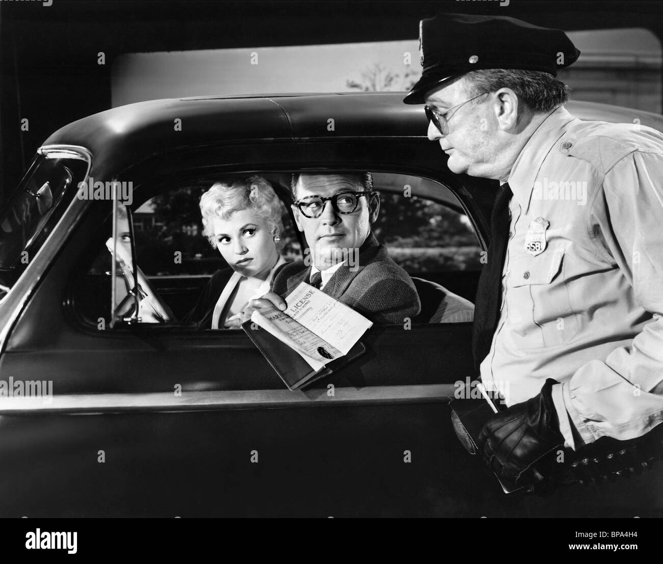 Mit JUDY HOLLIDAY, William Holden, Geboren gestern, 1950 Szene Stockfoto