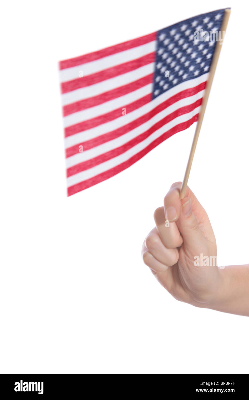 Eine menschliche Hand hält eine Fahne der Vereinigten Staaten von Amerika. Alle isoliert auf weißem Hintergrund. Stockfoto