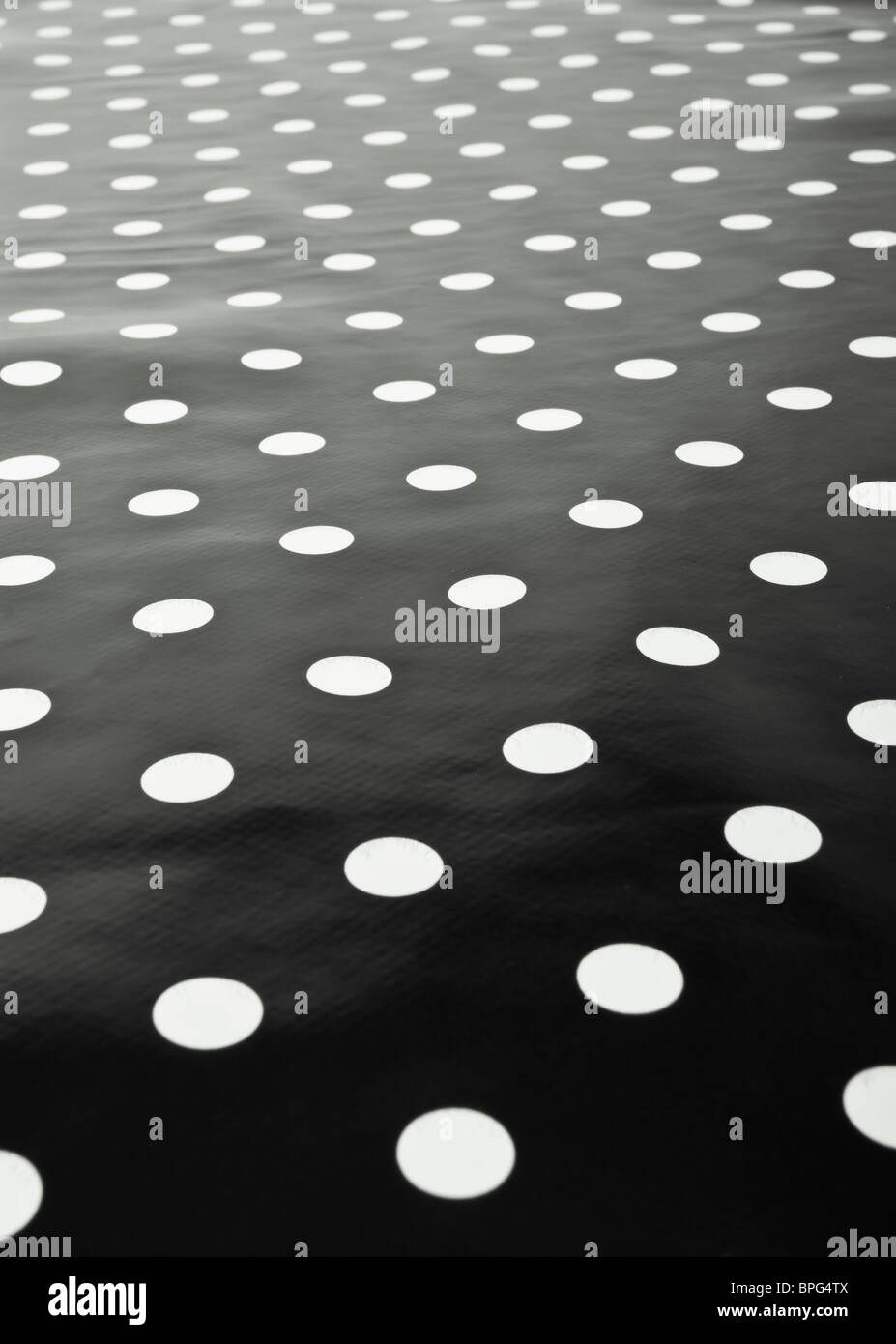 Schwarz / weiß fleckig Polka Dot Hintergrund. Stockfoto