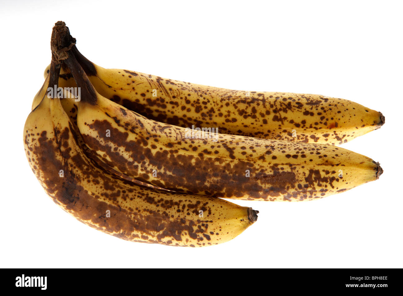 Haufen über reife Bananen auf weißem Hintergrund Stockfoto