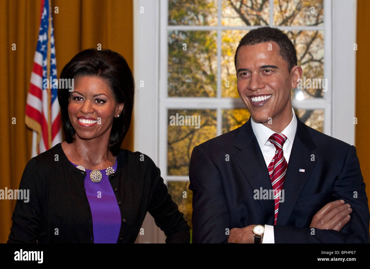 Michelle und Barack Obamas Wachsfiguren in einer Nachbildung des Oval Office bei Frau Tussauds London UK Stockfoto