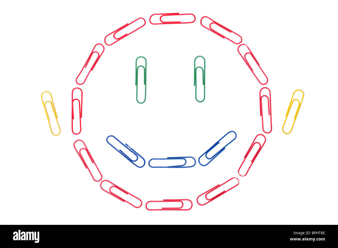 Büro-Smiley - lächelndes Gesicht bestehend aus Büroklammern. Stockfoto