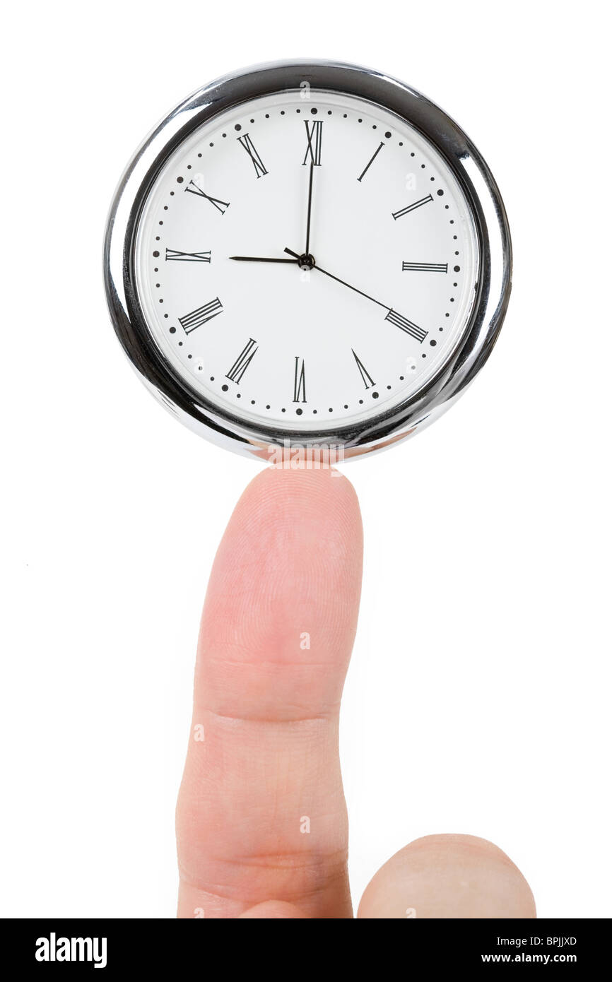 Ziffernblatt und Finger, Konzept der Zeit-Balance Stockfoto