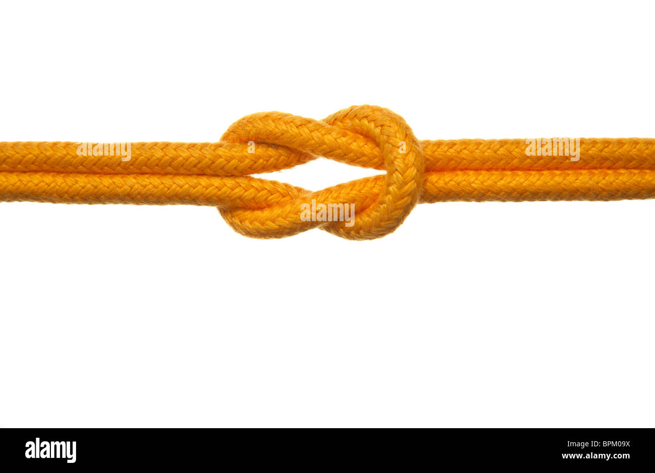 Ein gelbes Seil mit einem Kreuzknoten gebunden. Weißen Hintergrund. Stockfoto