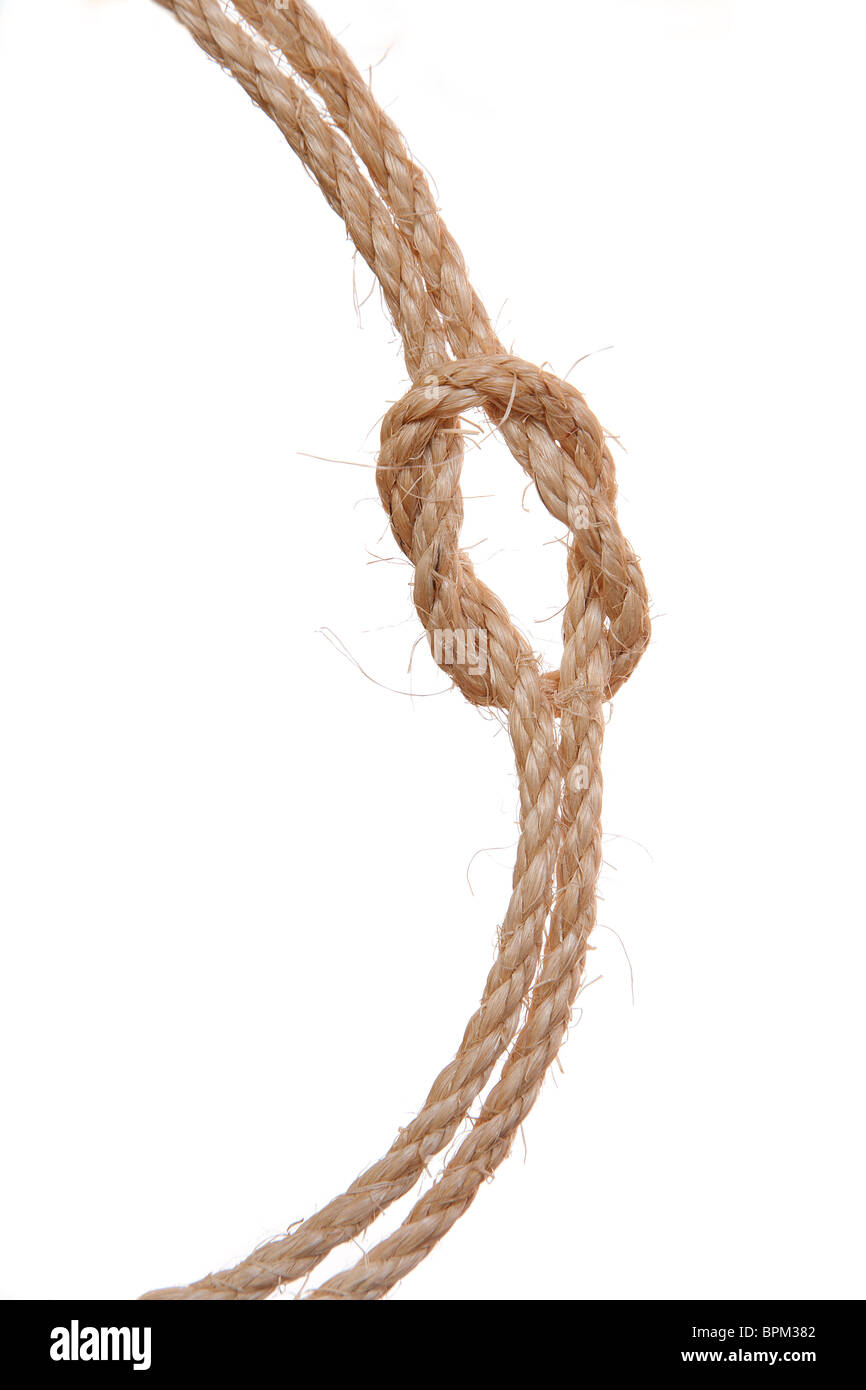 Seil mit einem Riff oder Kreuzknoten - isoliert auf weiss Stockfoto