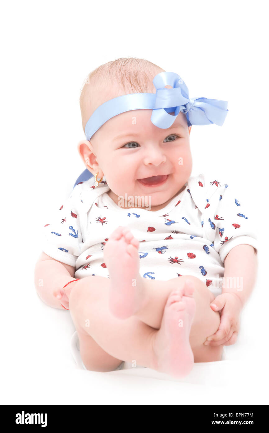 Entzückende Babymädchen auf weißem Hintergrund Stockfoto