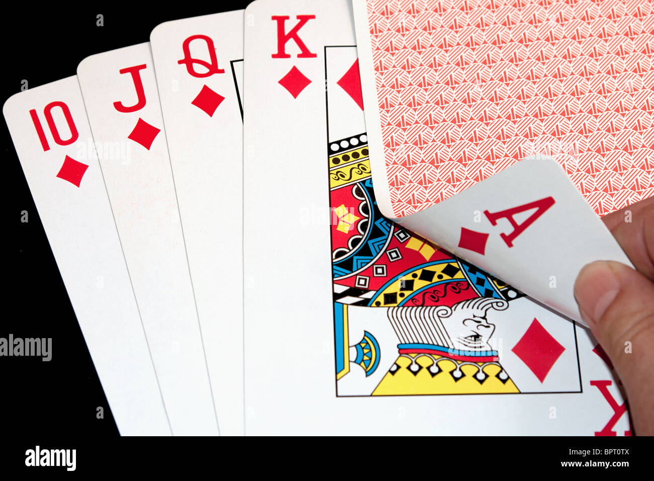 Royal Flush Pokerhand mit einer Karte, die nur durch Spieler gesehen Stockfoto
