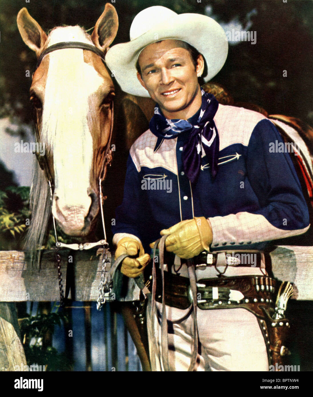 ROY ROGERS & TRIGGER SCHAUSPIELER MIT PFERD (1944) Stockfoto