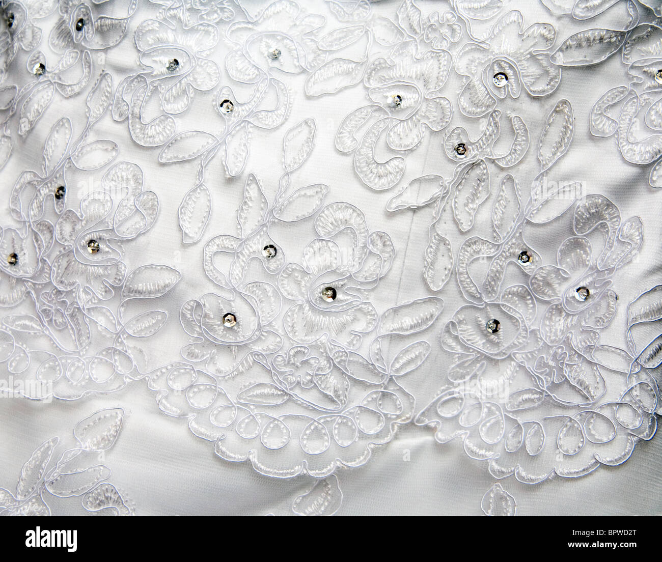 Detail eines teuren Spitze und Seide Brautkleid Stockfoto