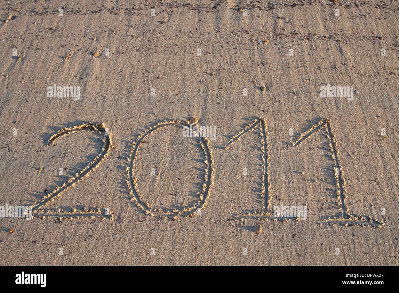 Jahr 2011 Datum geschrieben auf dem Sand des Strandes Stockfoto