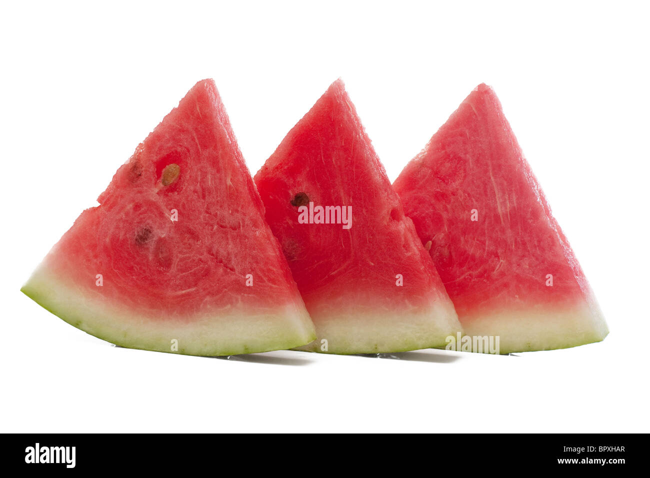 Drei Stücke Wassermelone isoliert auf weiß. Stockfoto