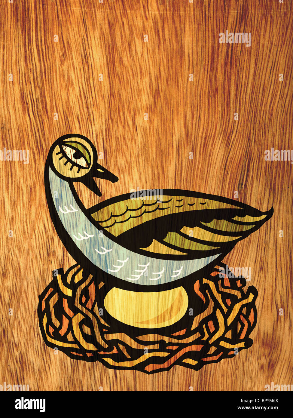 Ein Vogel sitzt auf einem goldenen Ei in einem nest Stockfoto