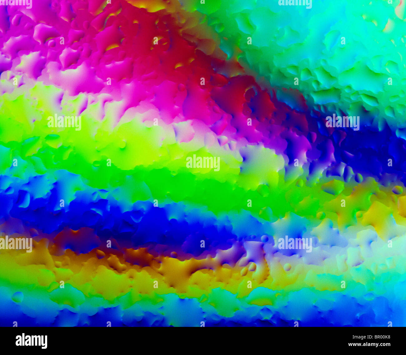 Abstraktes Bild von Wassertropfen durch cross-Polarisation gefärbt. Stockfoto