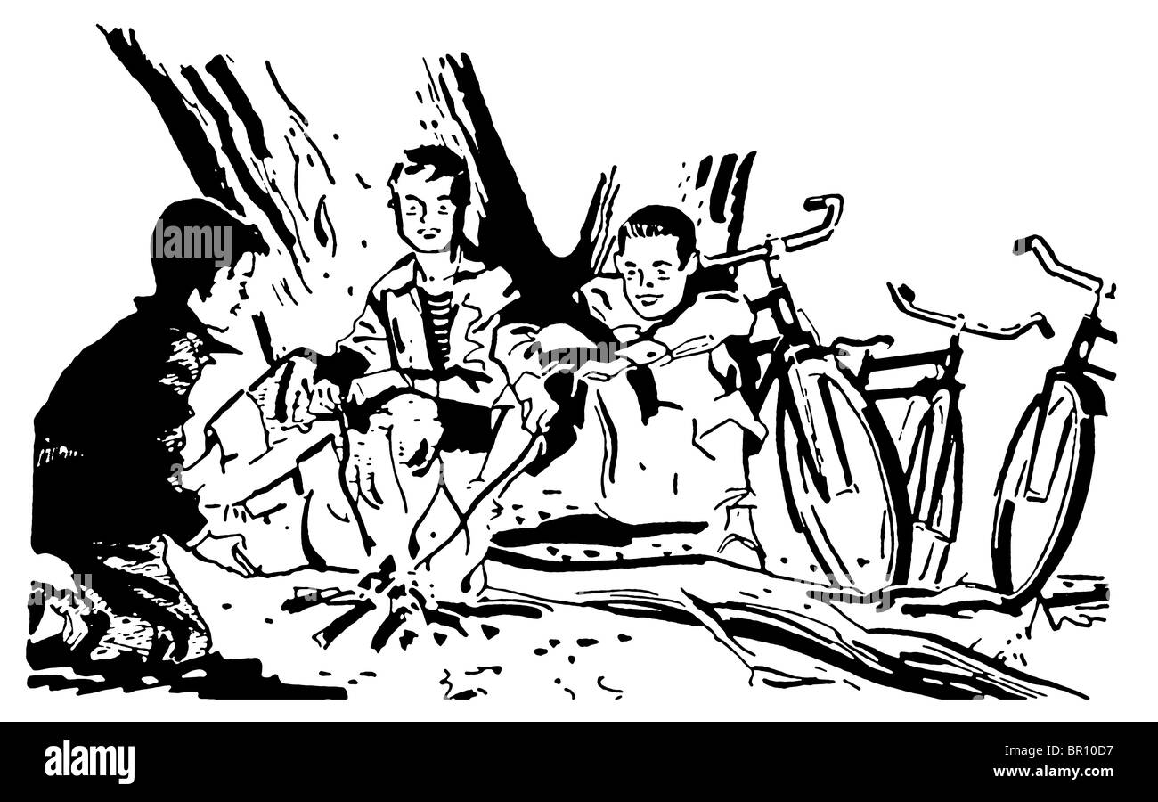 Eine schwarz-weiß Version von einer Gruppe von jungen um ein Lagerfeuer Stockfoto