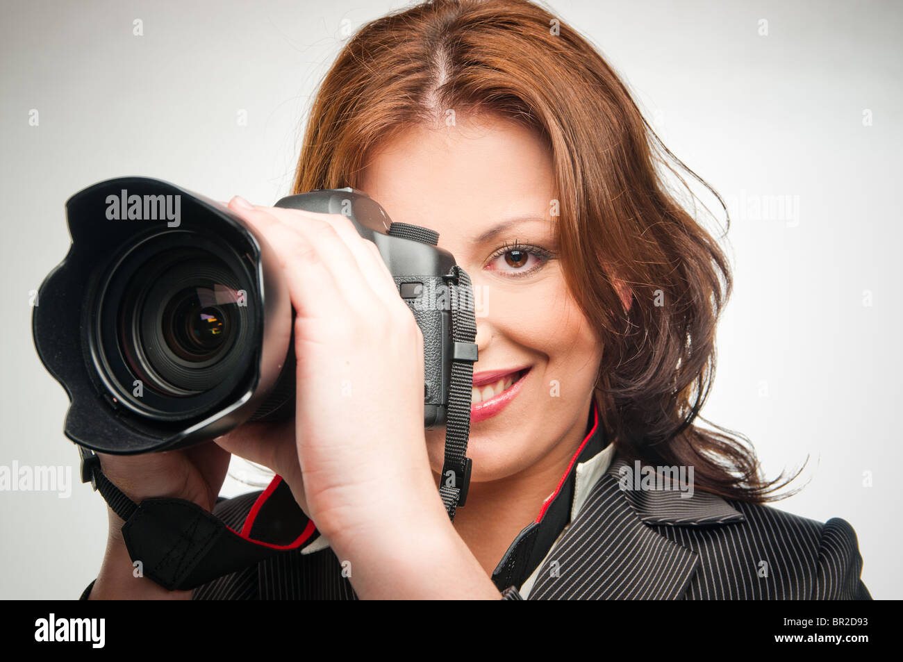 junges Mädchen mit Fotokamera Stockfoto