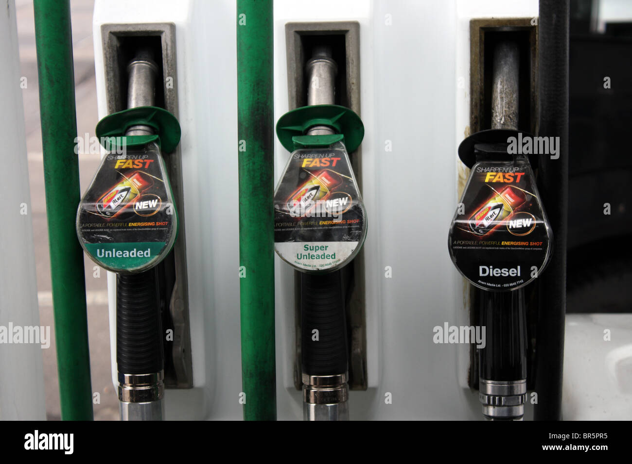 Diesel, Unleaded und Super bleifrei Benzinpumpen an einer Tankstelle. Stockfoto