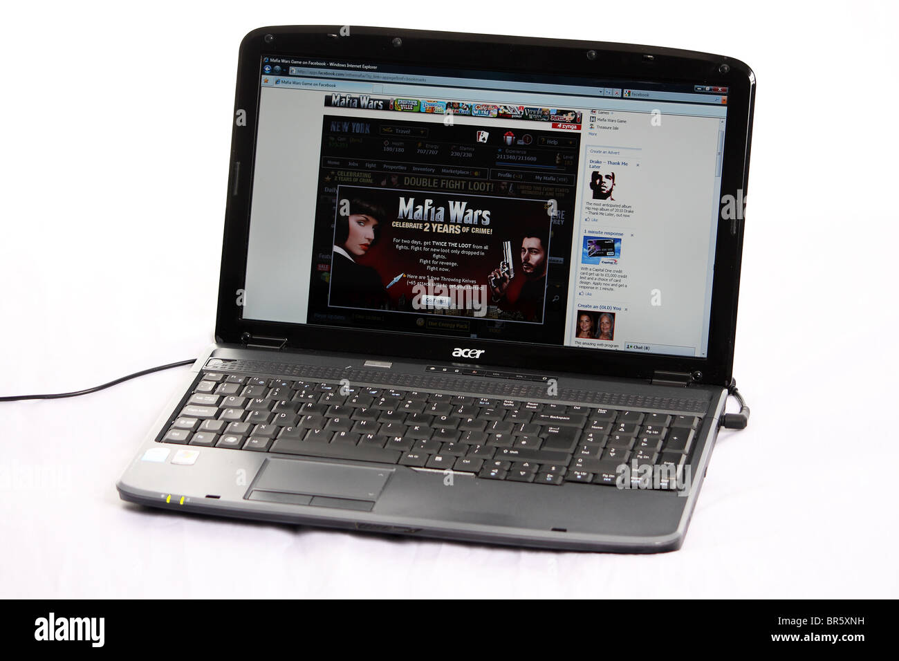Mafia Wars von Zynga auf einem Acerlaptop über die Facebook social-networking-Website im Internet gezeigt. Stockfoto