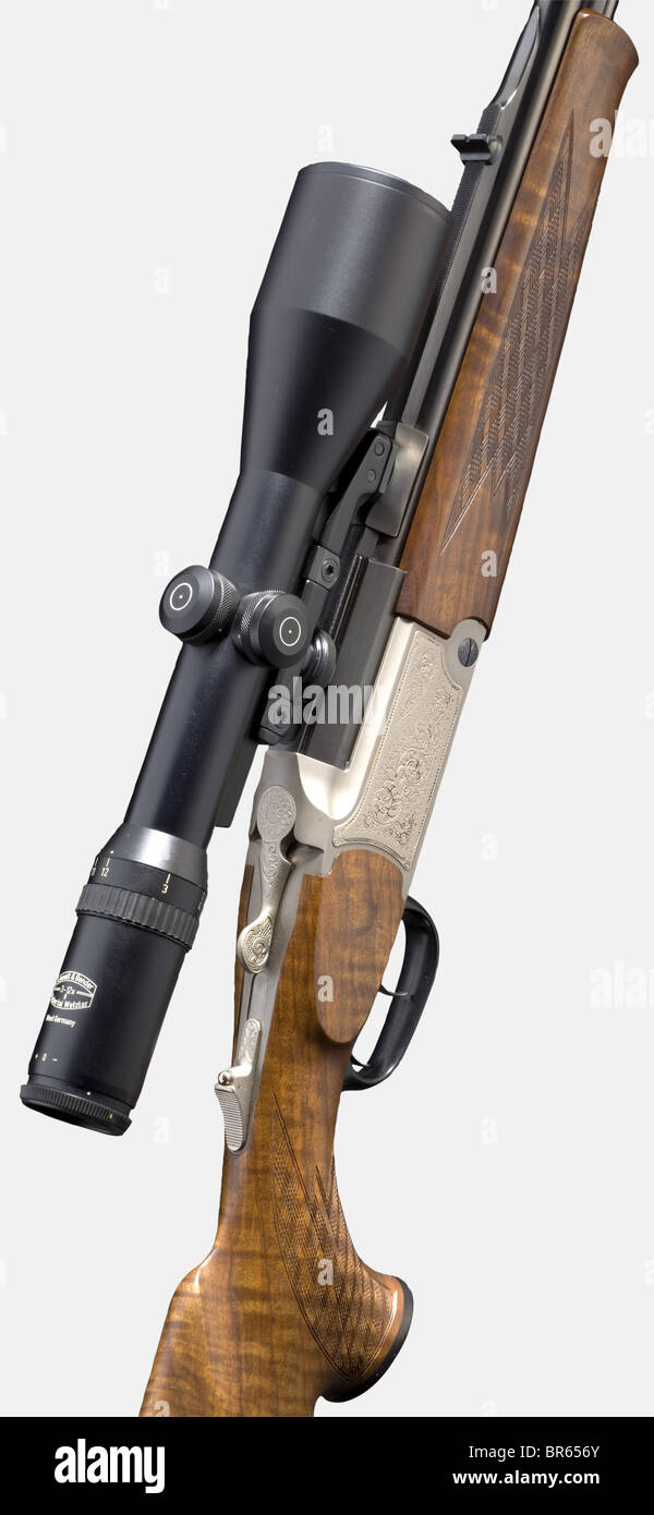 Ein zweibartiger "Berg- und Talstutzen" (Berg- und Talkarbine) Blaser Mod. B 750/88 mit Schmidt & Bender Scope, 7 x 65R/.222 cal. REM., nein 5/44354. Spiegelähnliche Bohrungen, Fasslängen 60 cm. Beweiszeichen 1994. Fester Anblick. Doppelbolzenverriegelung. Auswerfer. Kokkende Rutsche. Doppelter Trigger. Makelloser ursprünglicher Bluing. Nitratrahmen mit reicher Ziergravur. Feinkörniger Walnussschwund mit Wange, Pistolengriff und schottischem Kontrollring. Oben aufklappbare Halterung: Schmidt & Bender Scope 3 x 12-fach mit beschichteter Linse, Retikel 1, Okularschutz. Neuer Gesamtzustand, Stockfoto
