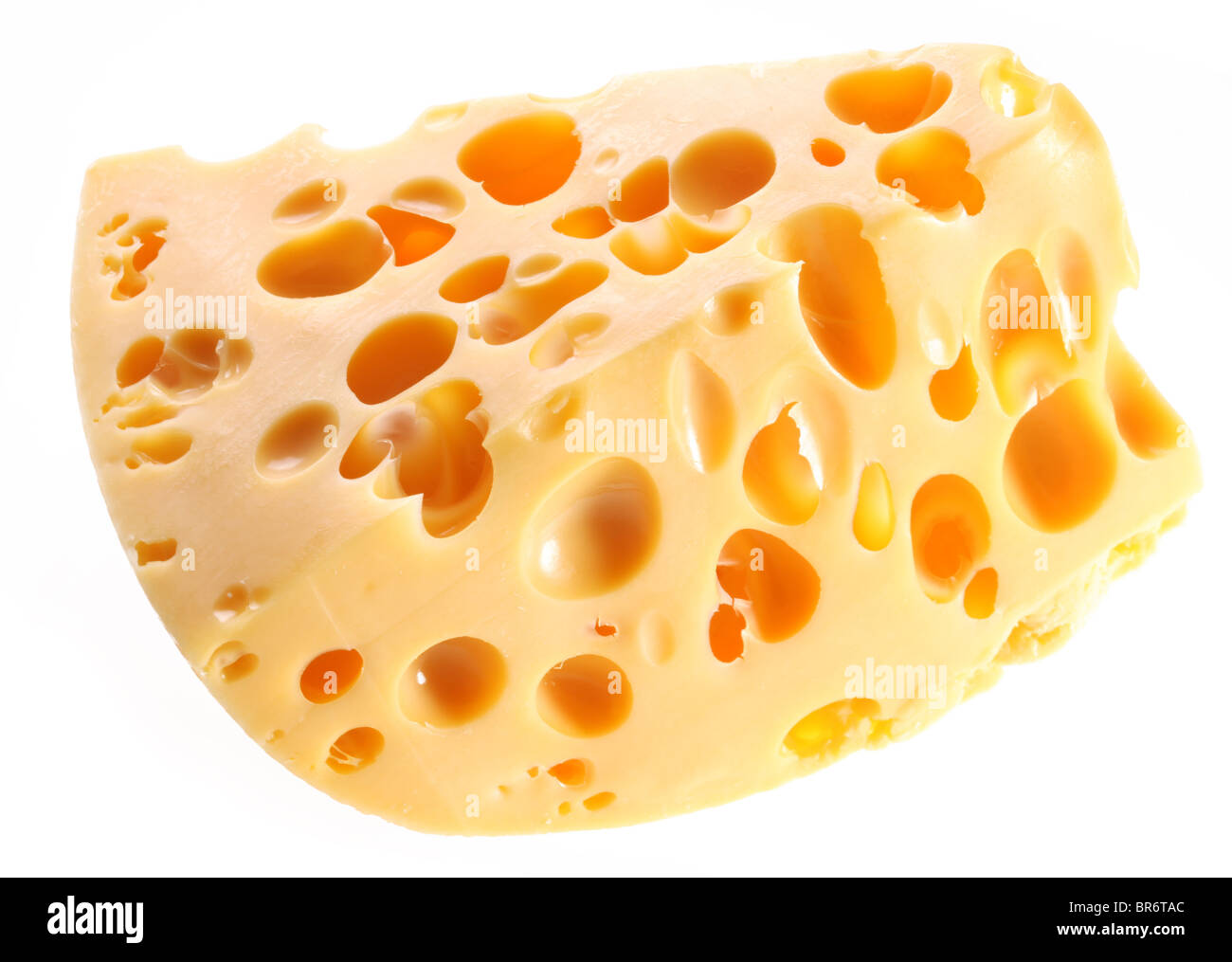 Stück Schweizer Käse auf einem weißen Hintergrund. Stockfoto