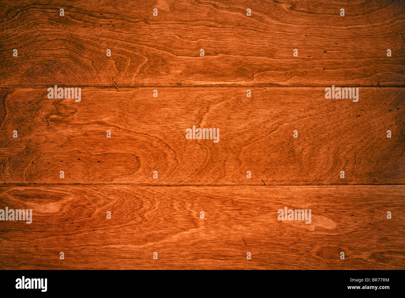 Einen schönen tiefen, satten Hartholz-Fußboden mit Holzmaserung Details für Gebrauch als und Hintergrund oder entsprechende Gehäuse Inferenz. Stockfoto