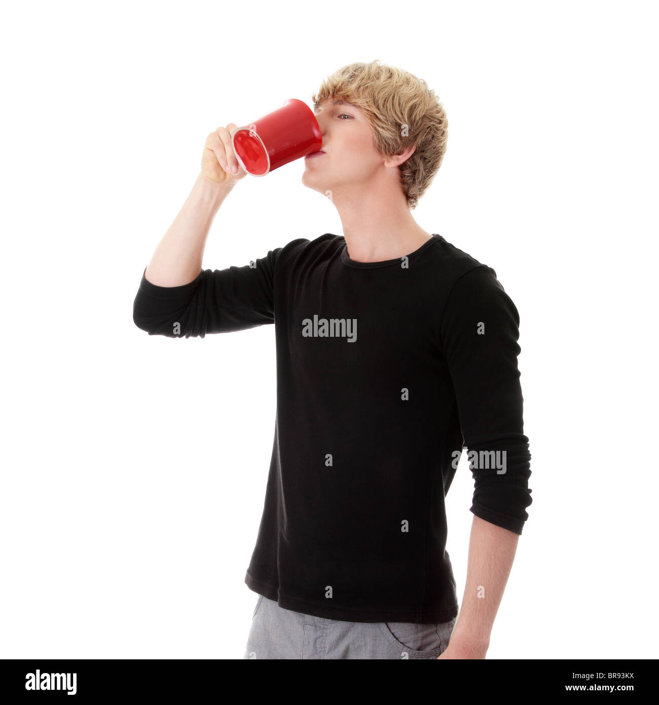 Man trinkt einen Kaffee oder Tee isoliert auf weißem Hintergrund Stockfoto
