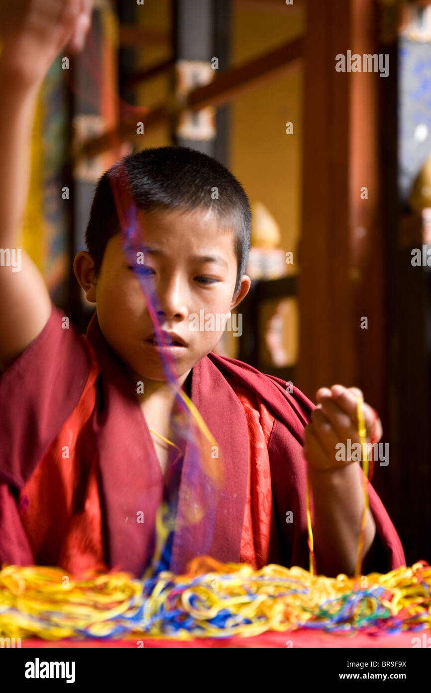 Ein Mönch, so dass Armband für Spenden in Bhutan. Stockfoto