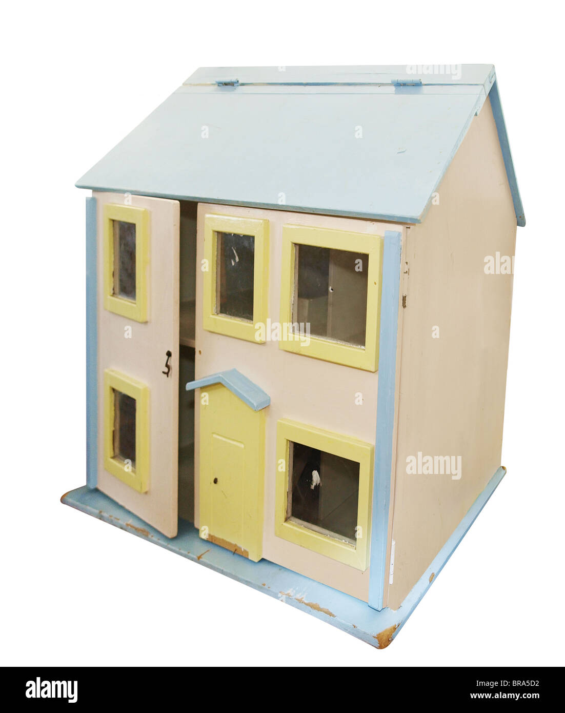 Altes Puppenhaus mit Beschneidungspfad isoliert Stockfoto