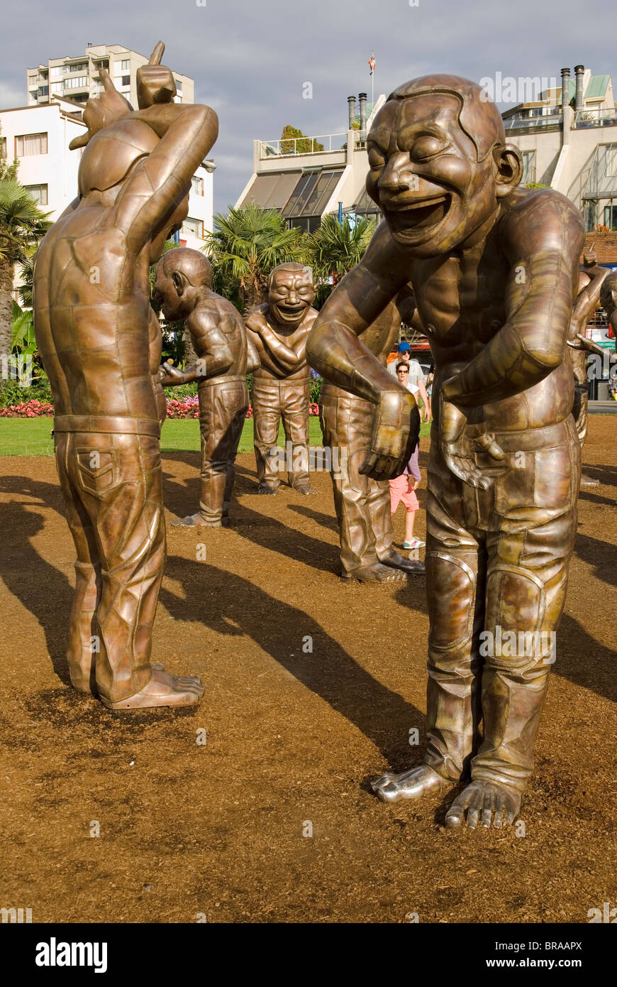 'A-Labyrinth-Ing Lachen', Skulpturen von Yue Minjun. Vancouver, British Columbia, Kanada Stockfoto