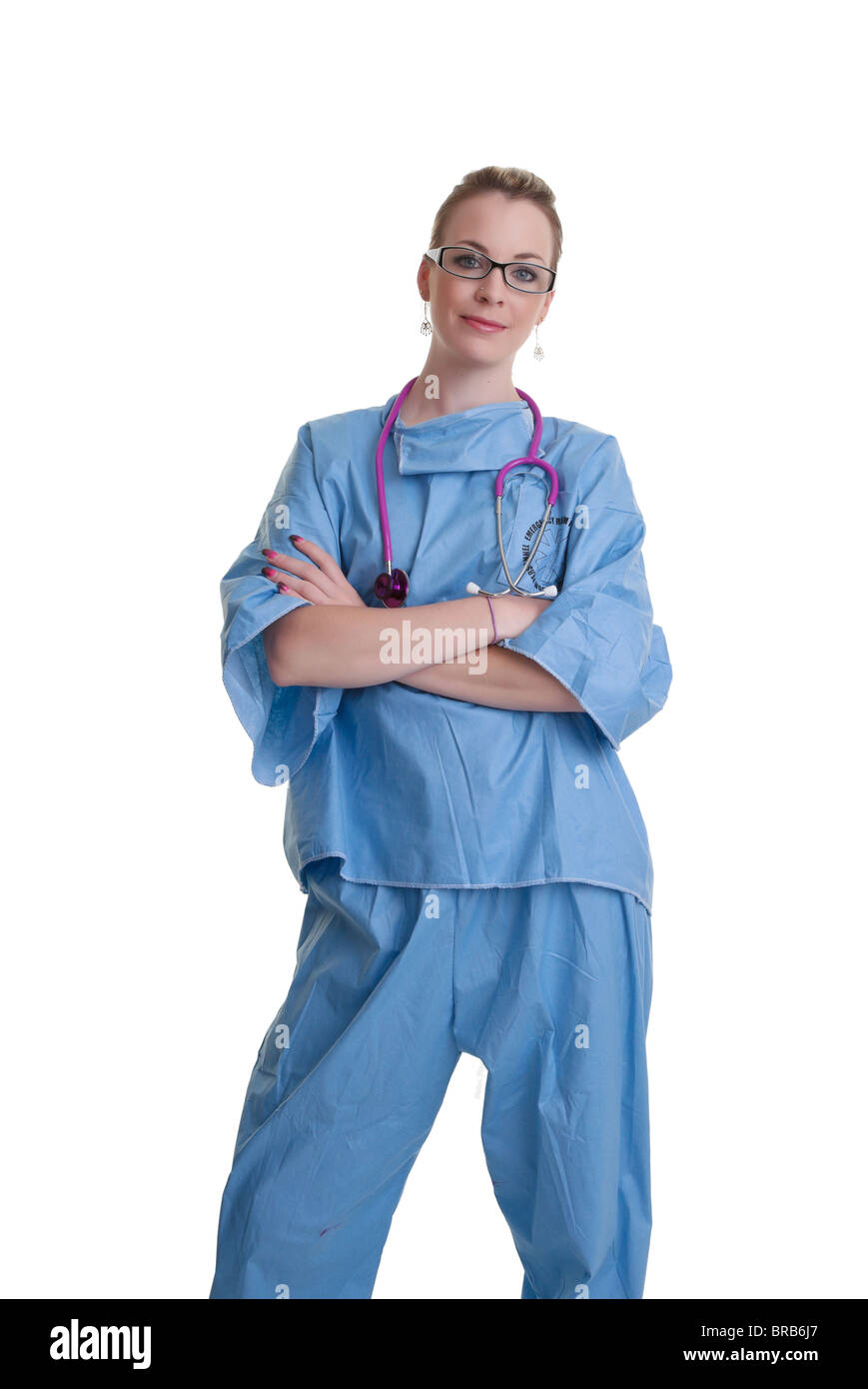 junger Arzt oder Krankenschwester in blau scheuert sich isoliert auf weißem Hintergrund Stockfoto