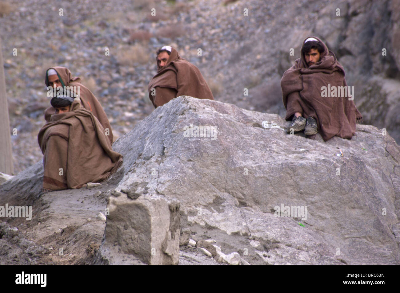 Männer in den Bergen von Afghanistan Stockfoto