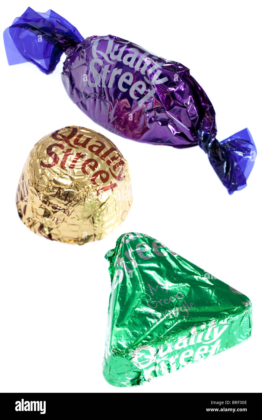 3 Quality Street verpackt Schokolade mein lila mein grünes Dreieck und meine Wirbel-Karamell Stockfoto