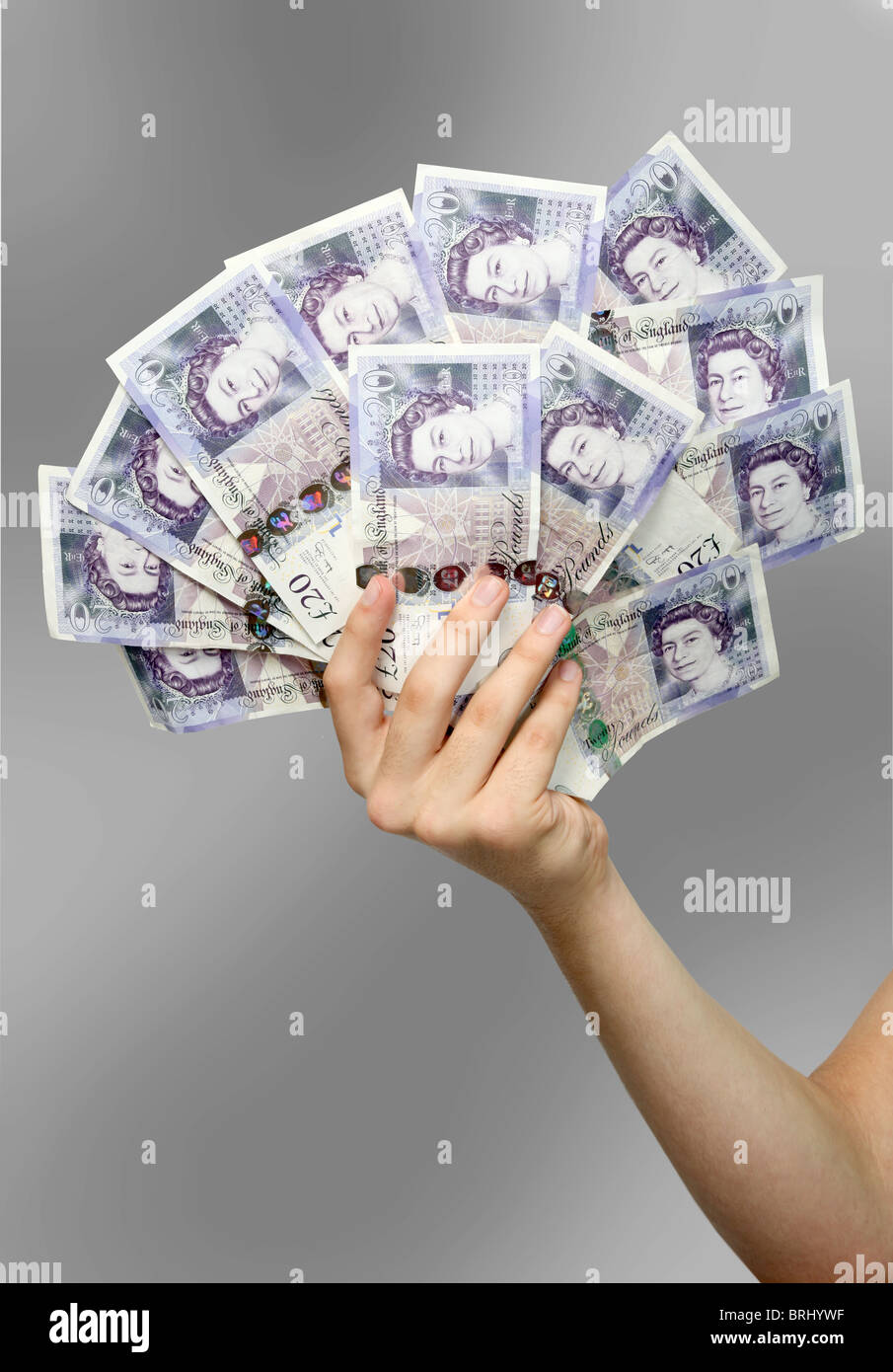 Britische £20 Noten durch männliche Hand gehalten Stockfoto