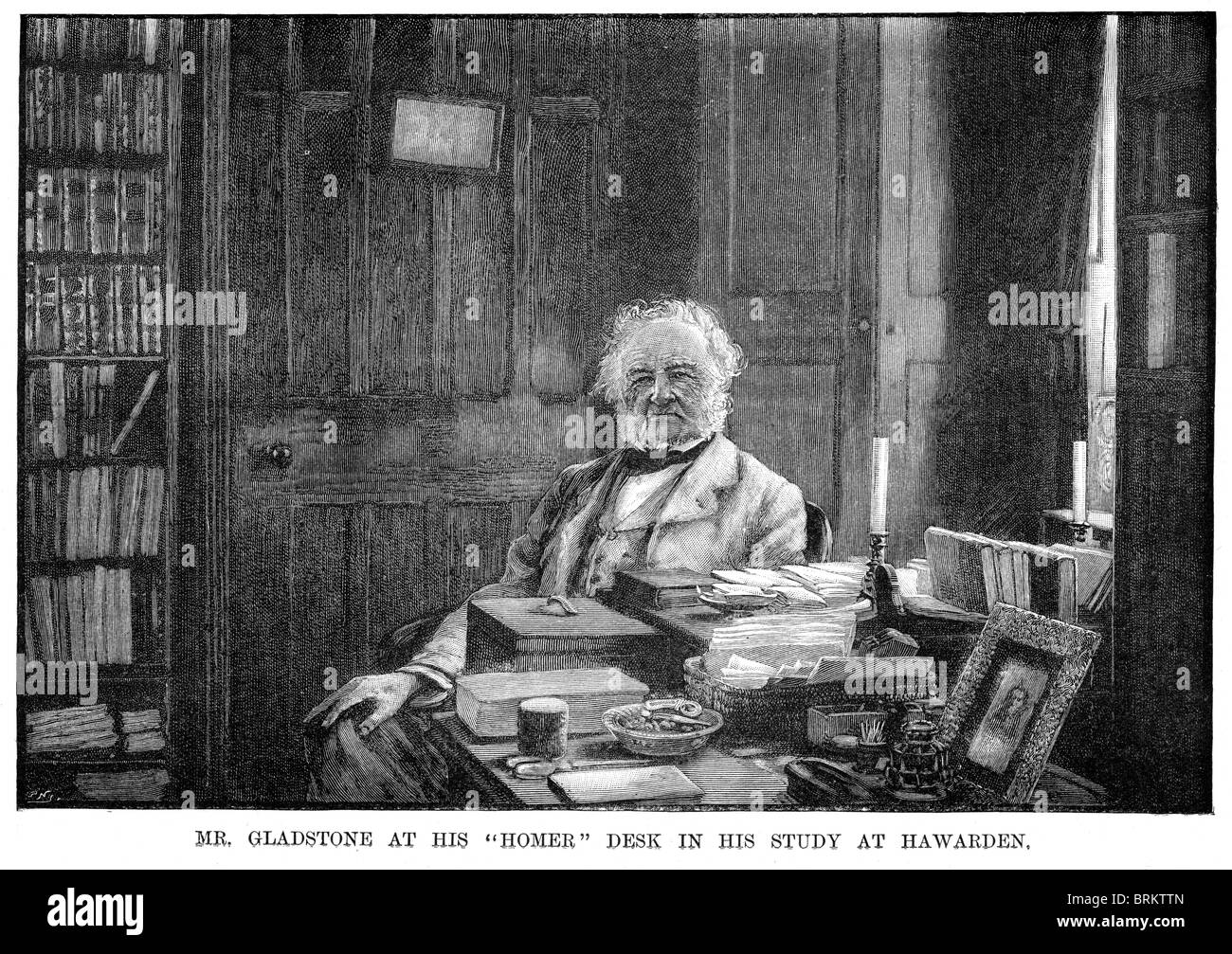 William Ewart Gladstone in seinem Arbeitszimmer an seinem Homer Schreibtisch bei Hawarden Stockfoto