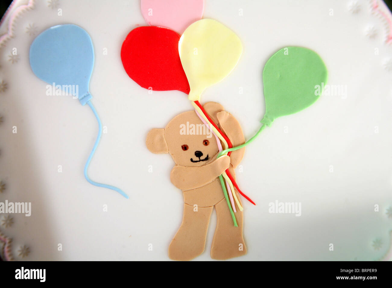 Zucker-Handwerk-Teddy mit Luftballons Stockfotografie - Alamy