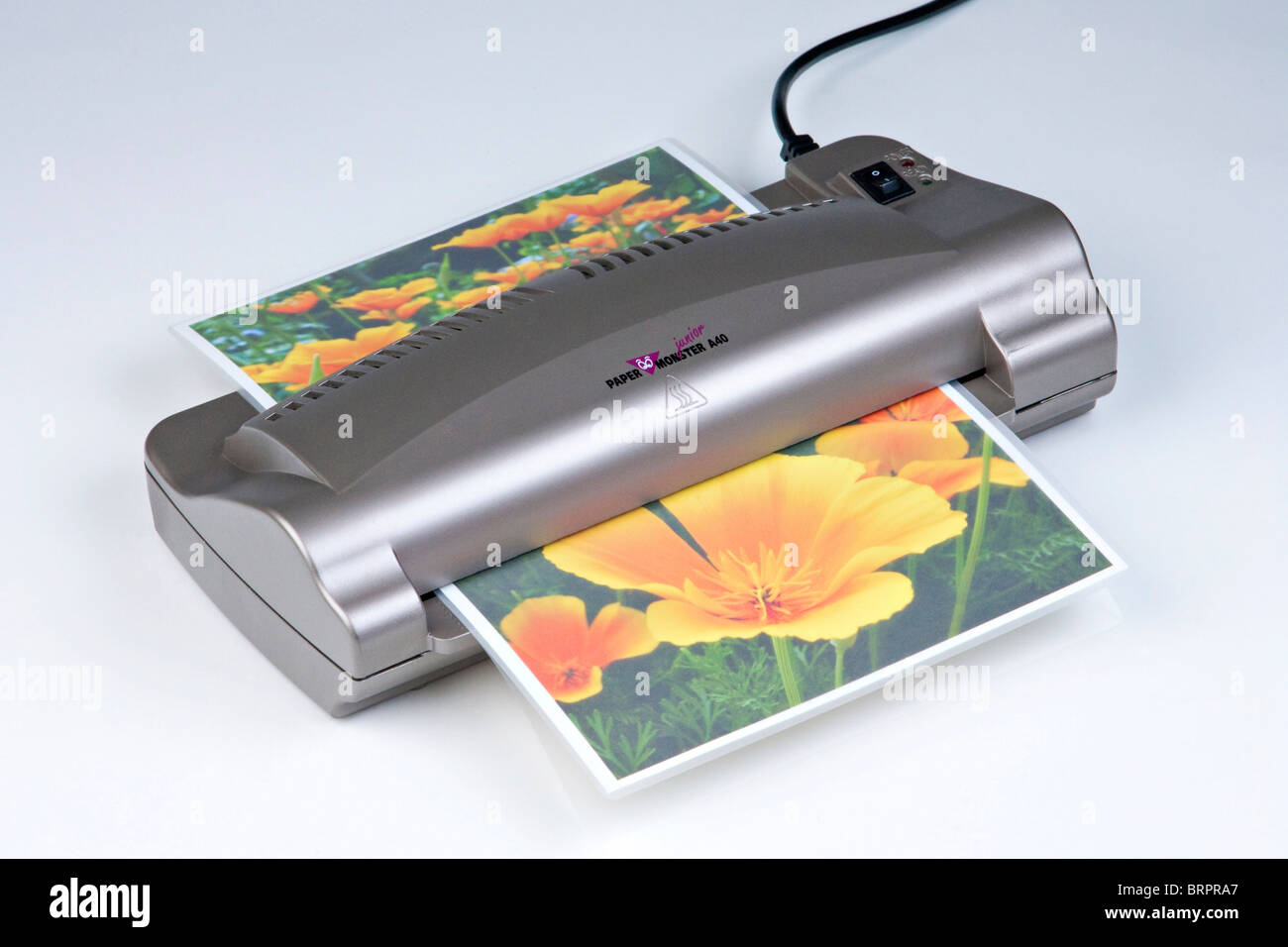 Laminiermaschine -Fotos und -Bildmaterial in hoher Auflösung – Alamy
