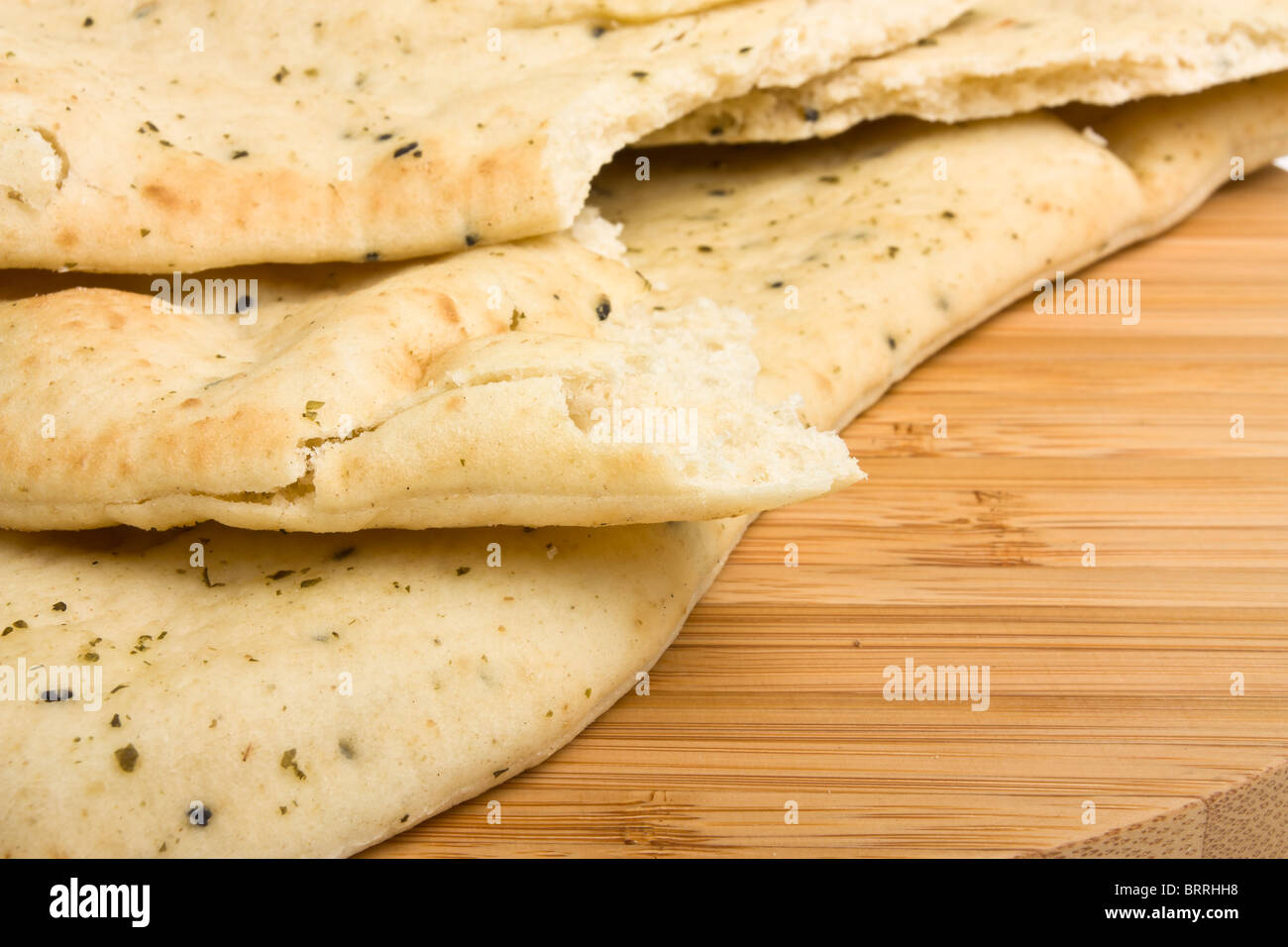 Indische ungesäuertes Brot Beilage bekannt als Naan-Brot in der Regel mit Curry serviert. Stockfoto