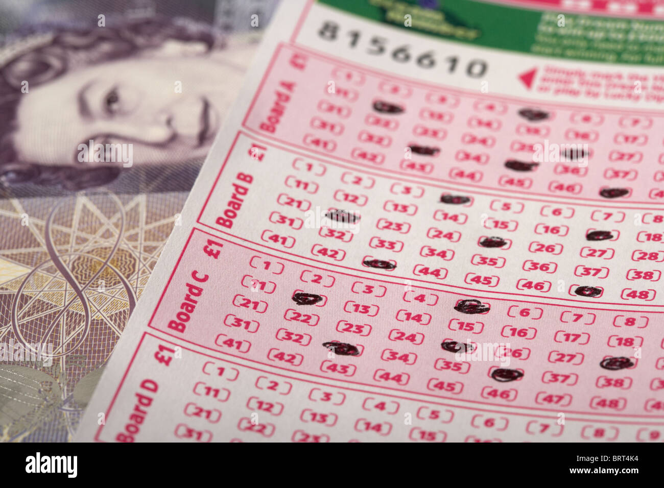 UK-britischen national Lottery Lotto Tipps und zwanzig Pfund-note Stockfoto