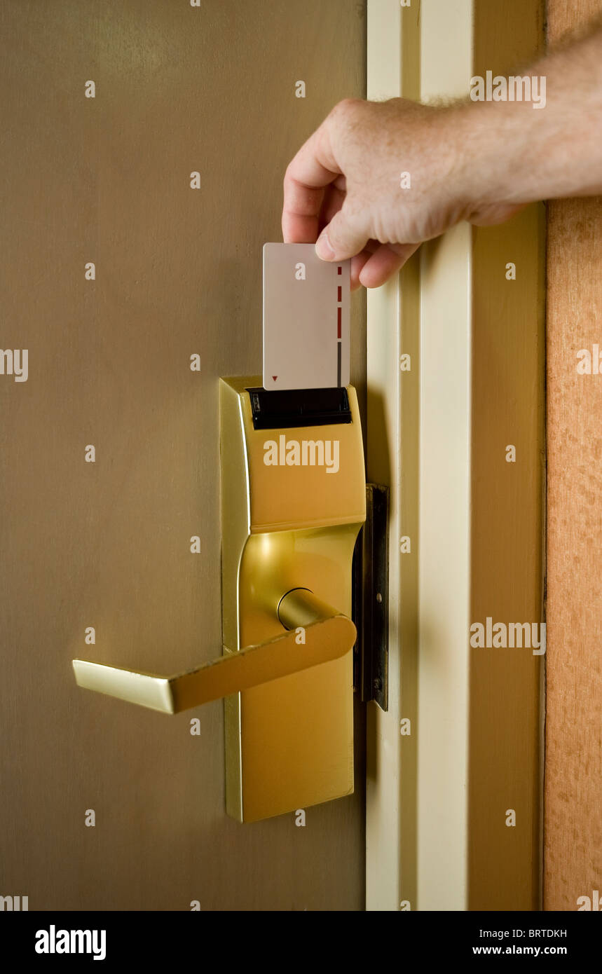 Hotel Tür und Hand mit Magnetkarte Schlüssel, Chicago USA Stockfoto