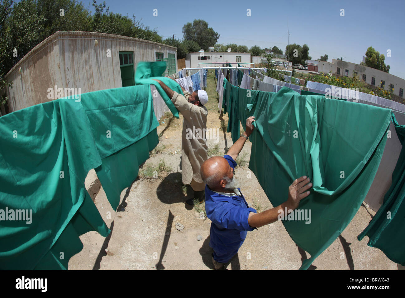 Wäsche Waschen Waschküche Gummischürze Stockfotos und -bilder Kaufen