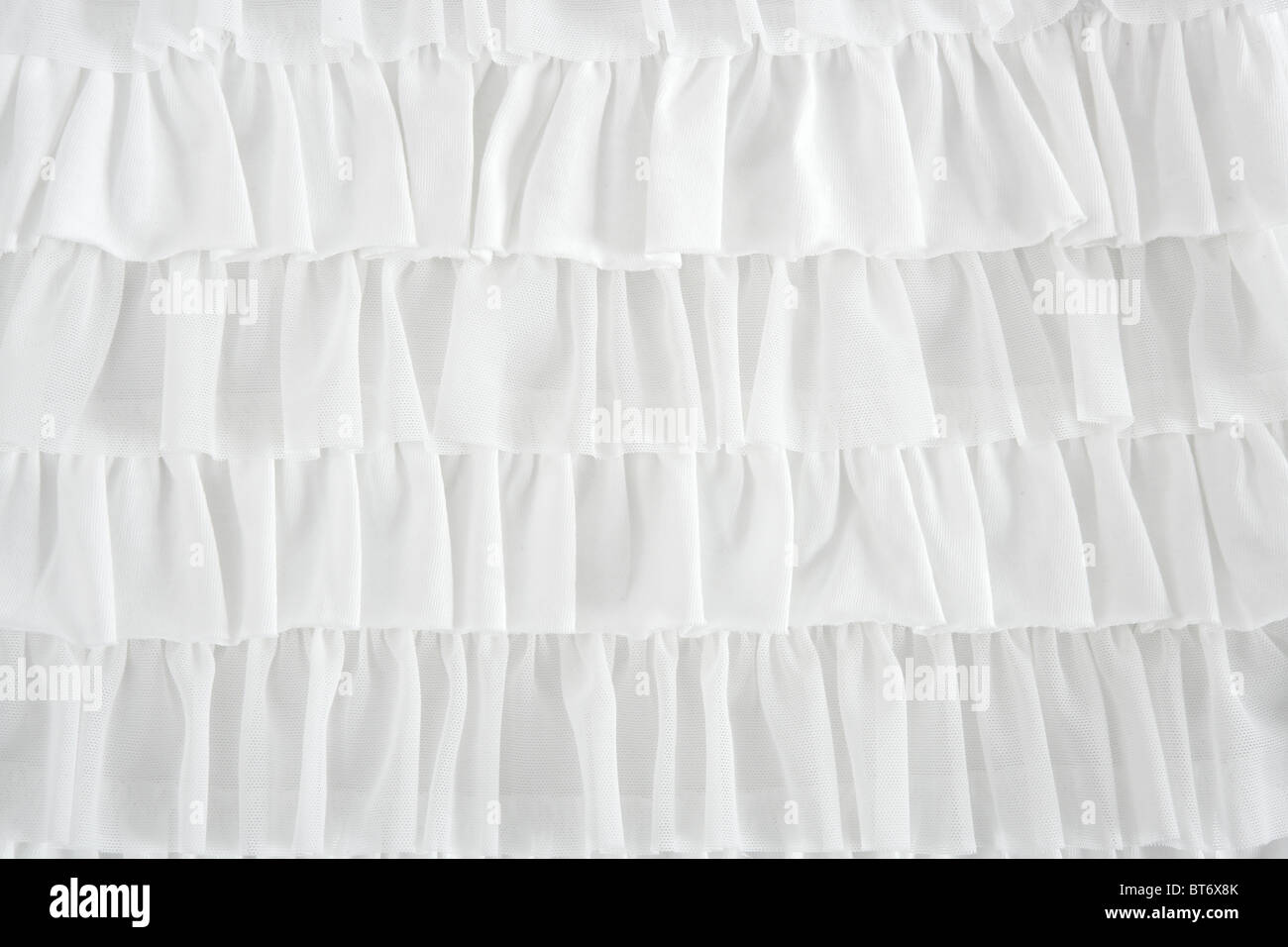 Faltenrock Stoff Mode in weißen Nahaufnahme Detail Makro Stockfoto