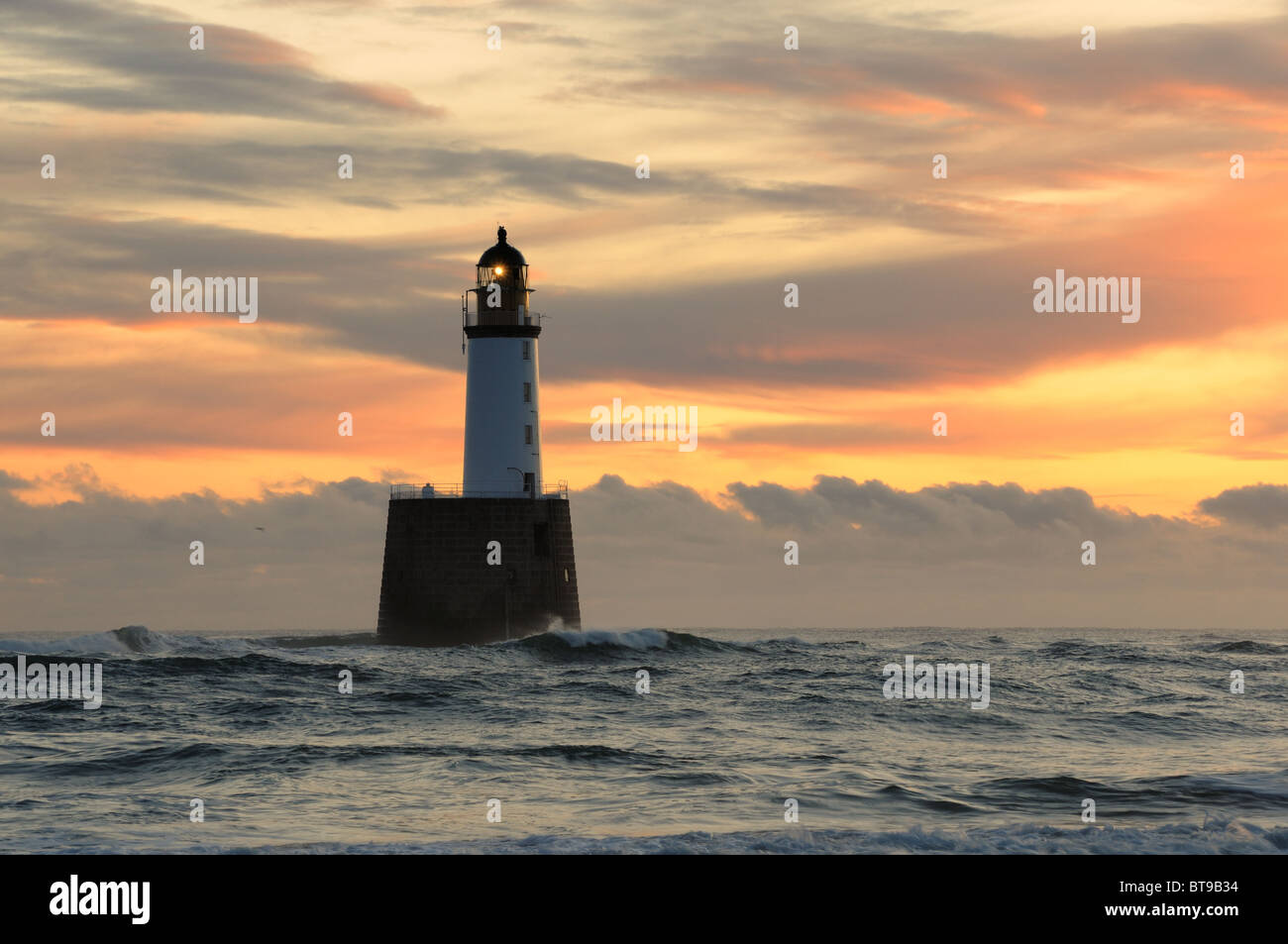 Rattray Head Leuchtturm bei Sonnenaufgang, Aberdeenshire, Schottland Stockfoto