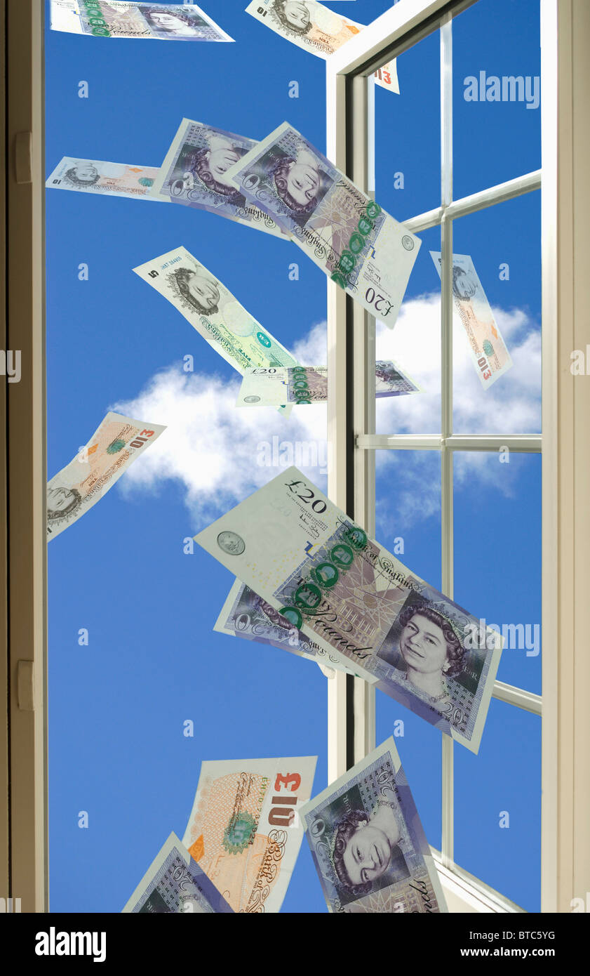 Geld aus dem Fenster Stockfoto