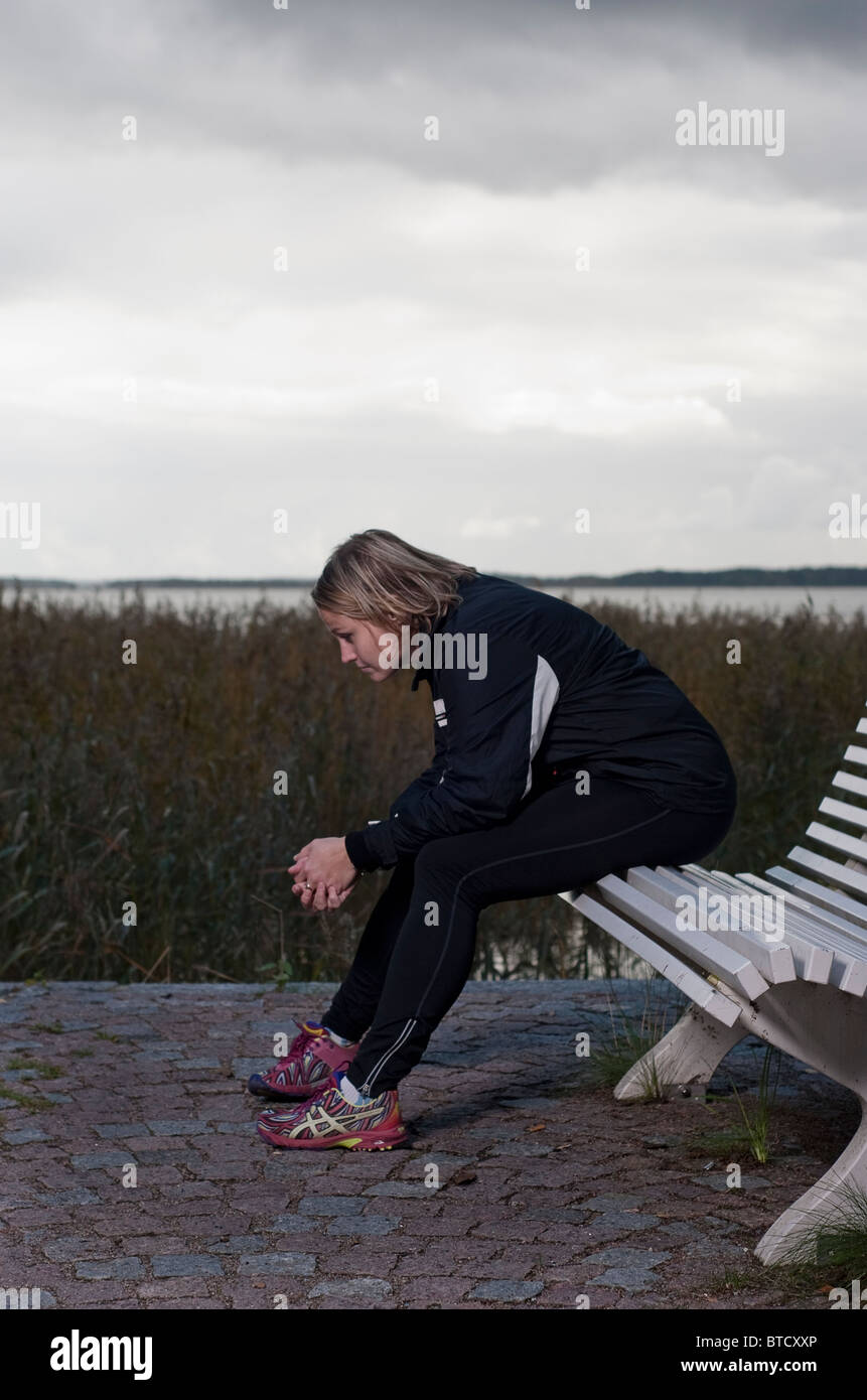 Weibliche Athleten eine Pause. Stockfoto