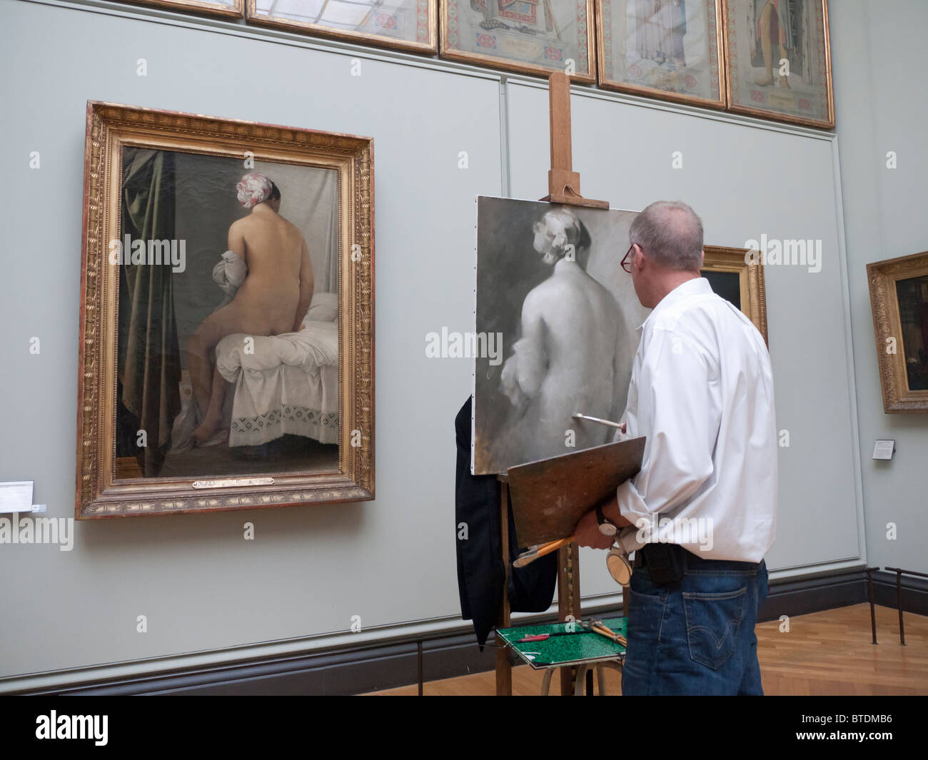 Künstler kopieren ein Gemälde im Louvre in Paris Frankreich Stockfoto