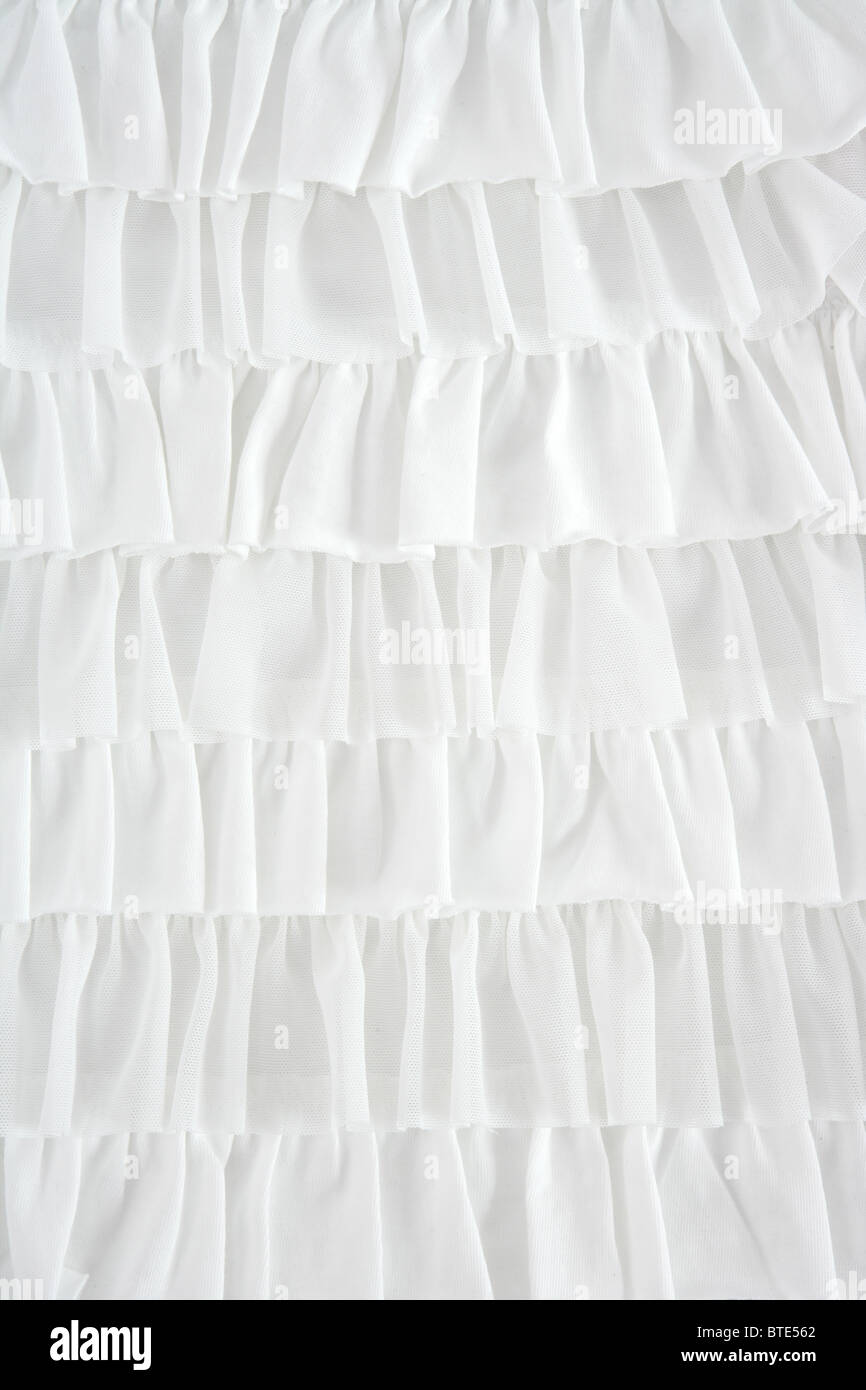 Faltenrock Stoff Mode in weißen Nahaufnahme Detail Makro Stockfoto