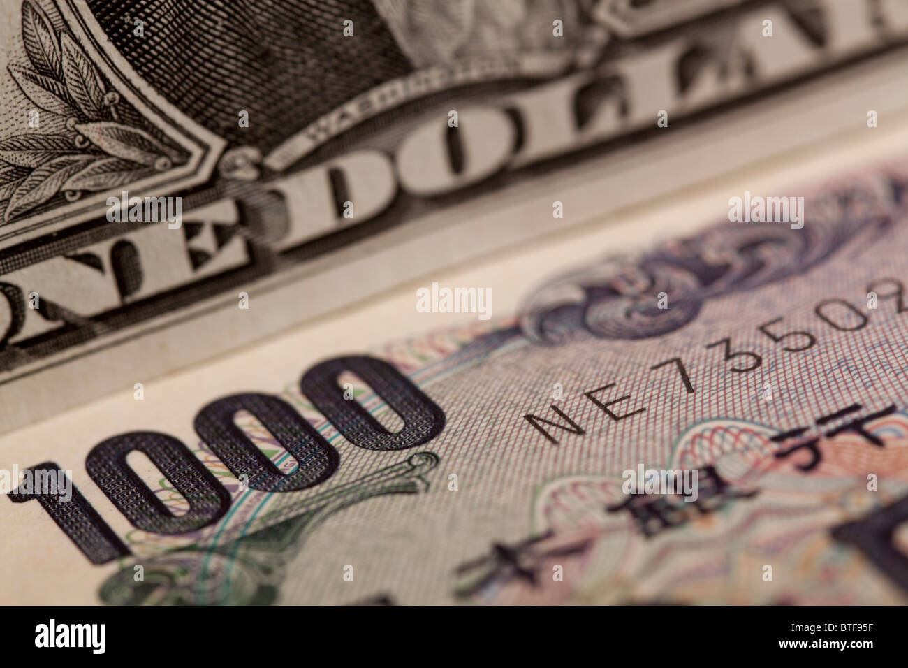 Ein Dollar-Note und 1000 Yen Geldschein Stockfoto