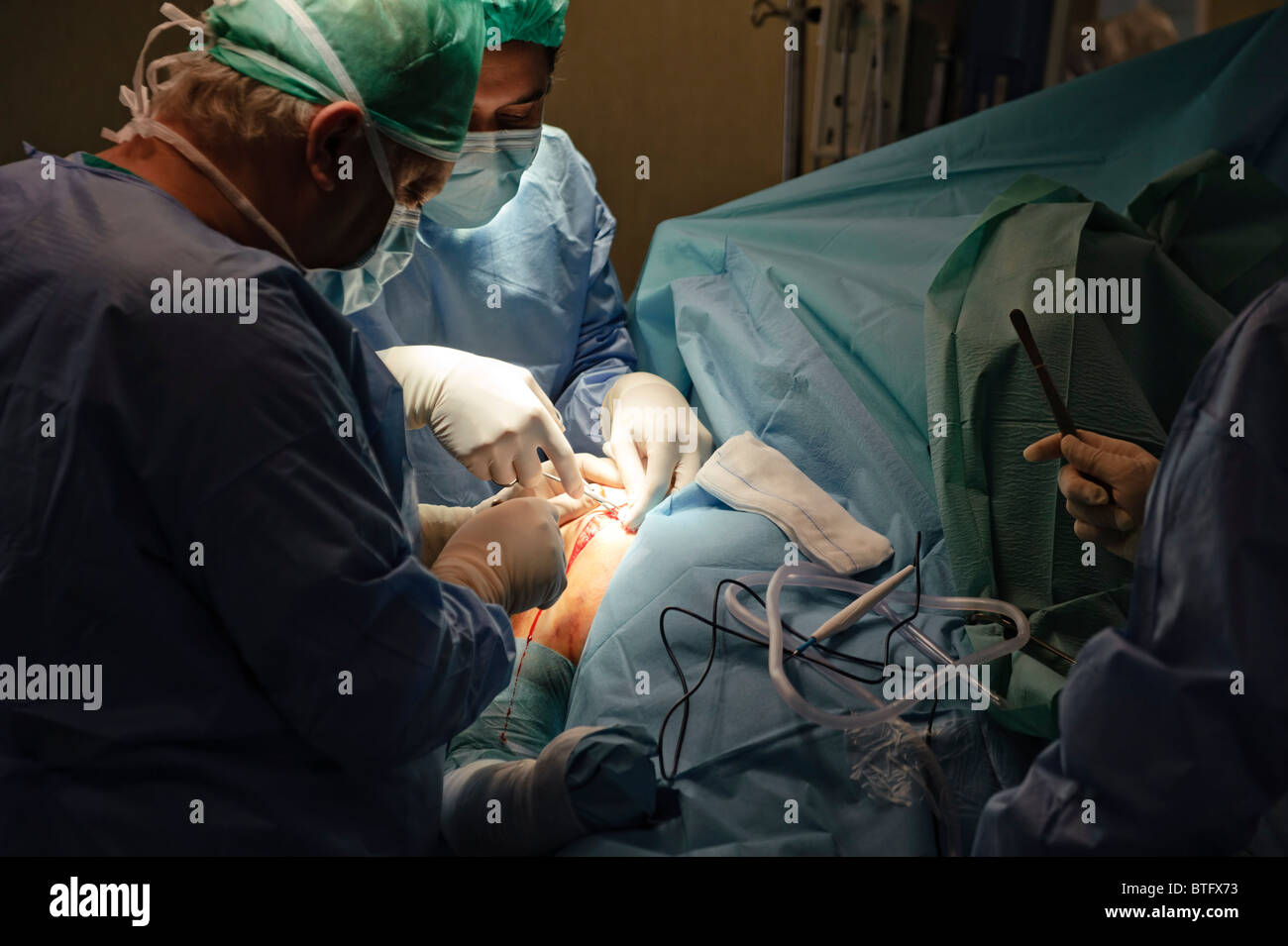 Ärzte der Chirurgie im OP-Saal Stockfoto