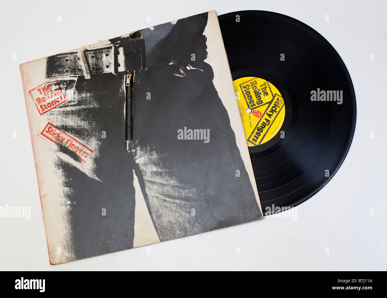 Die Rolling Stones 'Sticky Fingers" Vinylschallplatte und Albumcover. Stockfoto