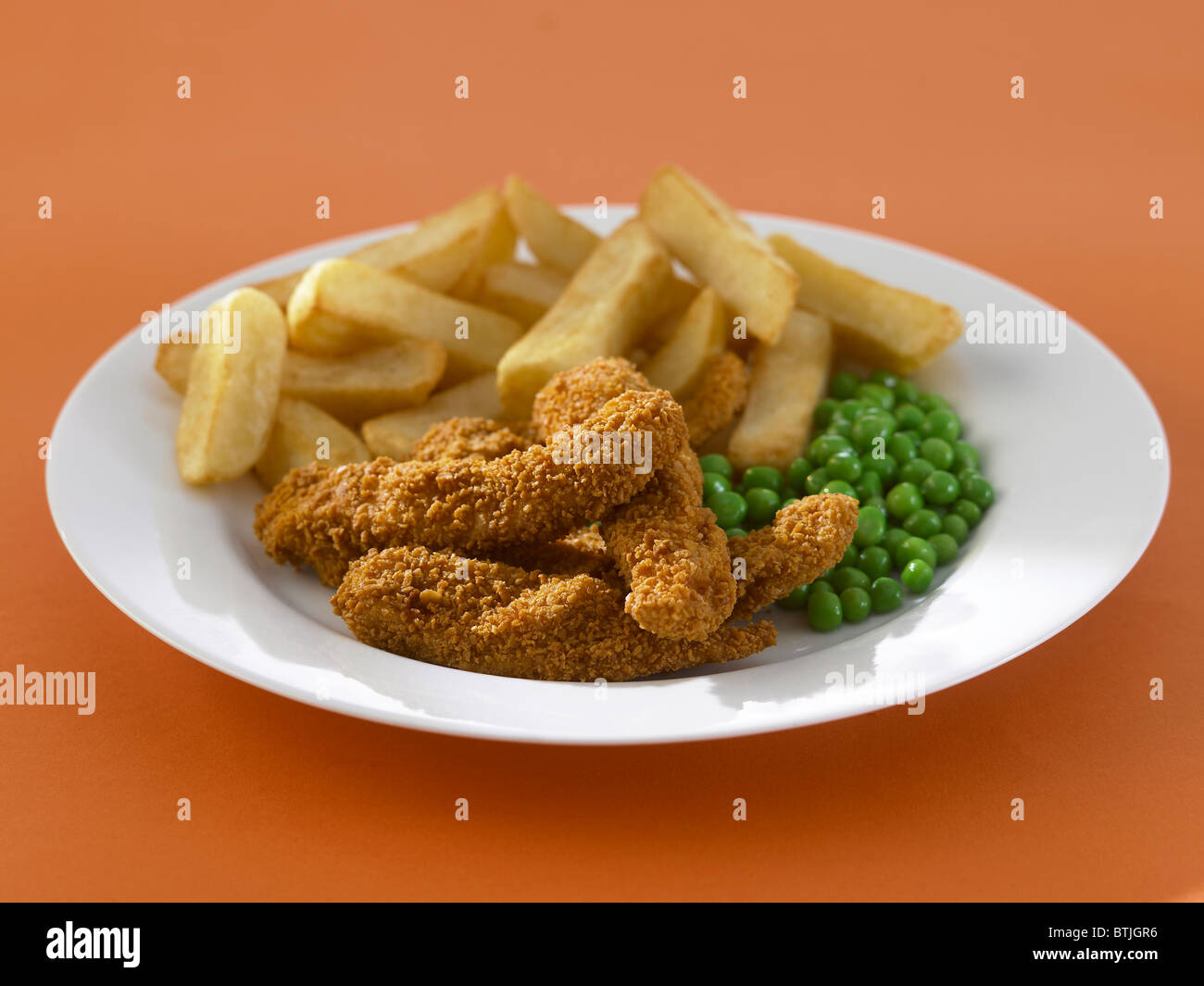 Panierte Chicken goujons Stockfoto