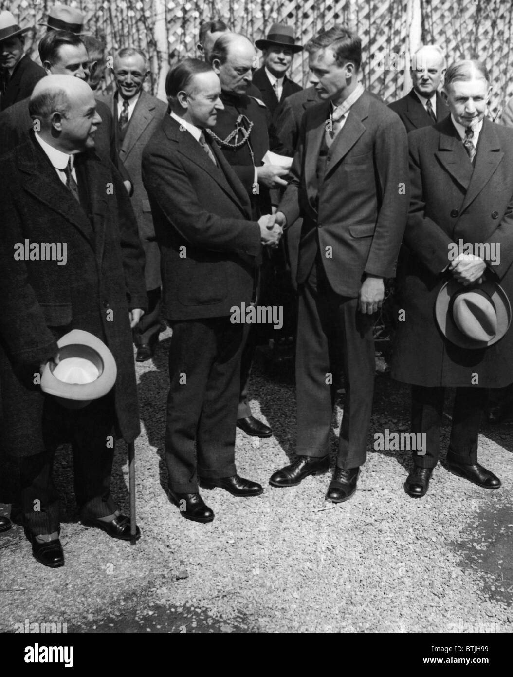 vordere Reihe, zweiter von links: Calvin Coolidge (US-Präsident 1923-1929), US-amerikanischer pilot Charles Lindbergh, Vice President Charle Stockfoto